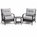 Set mobili da esterno in rattan con cuscini grigi
